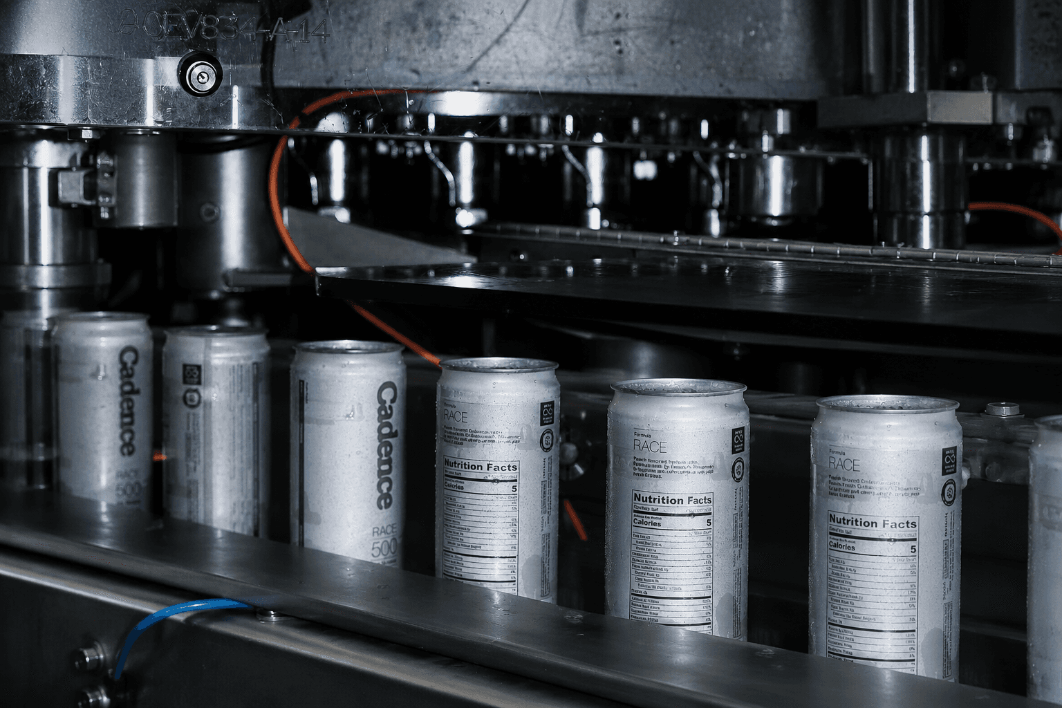 Cans moving along a beverage filling line